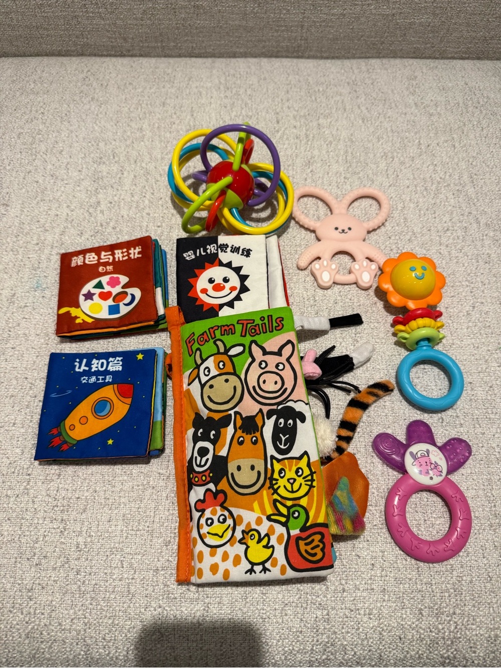 Like New 9 Various brand baby soft books and sensory rattle toys